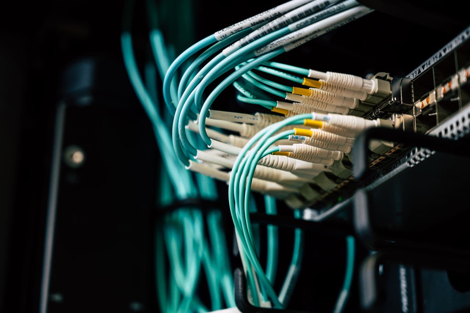 Optical fiber distribution and termination enclosure